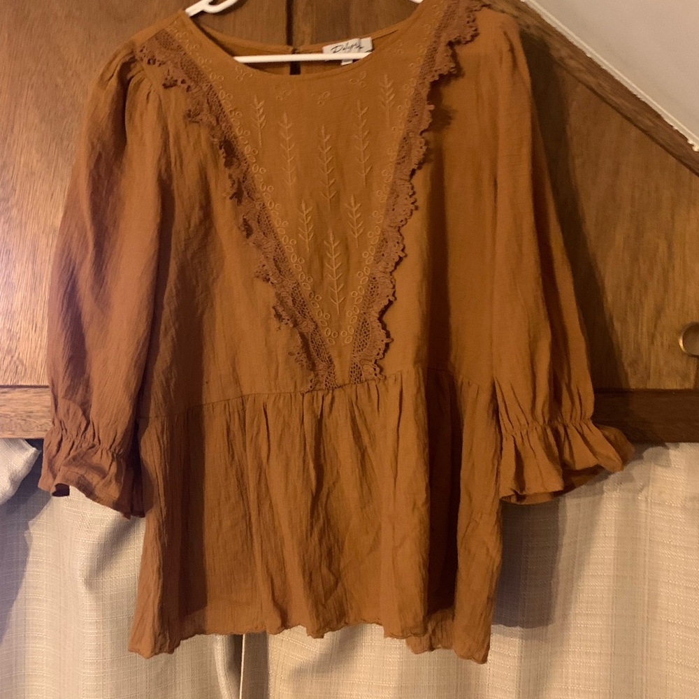 Dark mustard, yellow Polagram blouse with lace detailing and peplum
